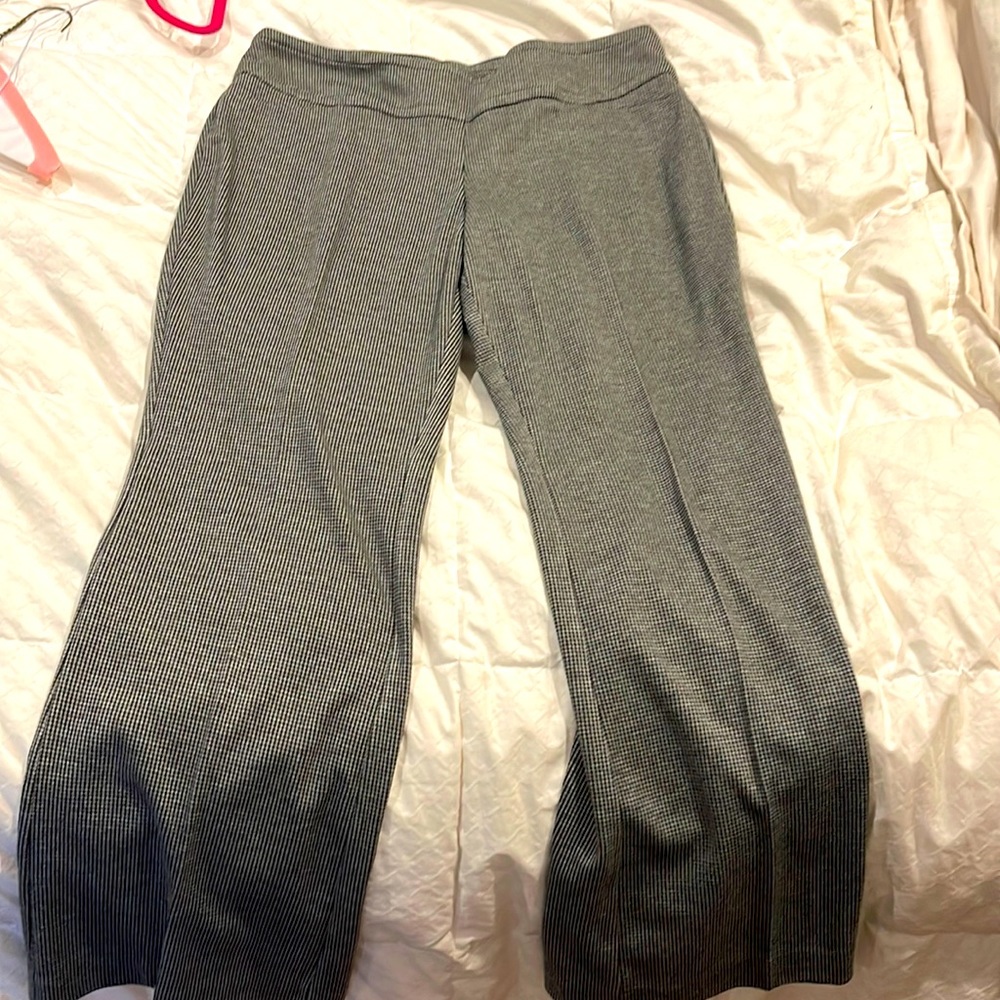 Black checked pull on dress pants.  Stretchy material straight leg. Worn once